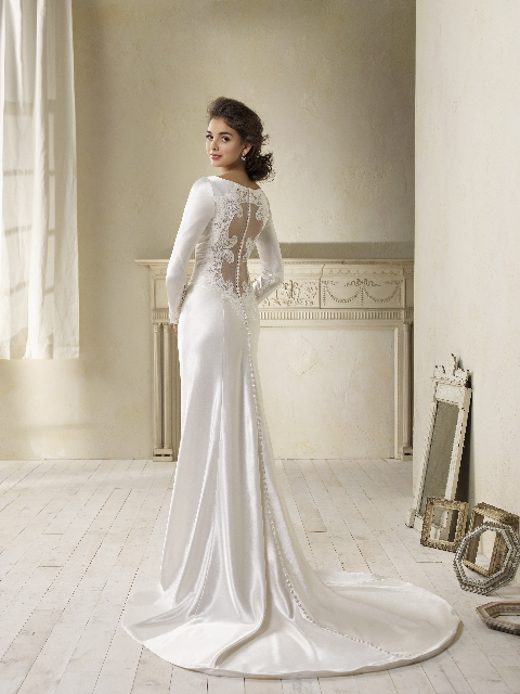 long sleeved bridal gown with its lace cuffs and incredible back detail