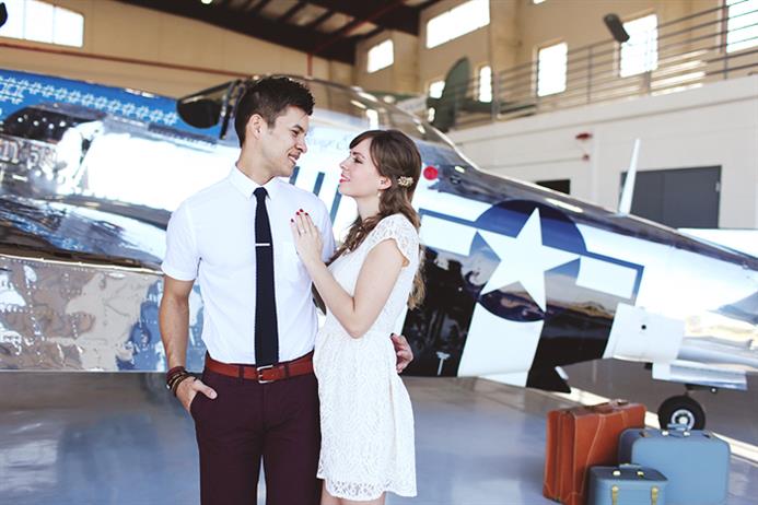 A Sweet Vintage Engagement Session at an Aeroplane Hangar