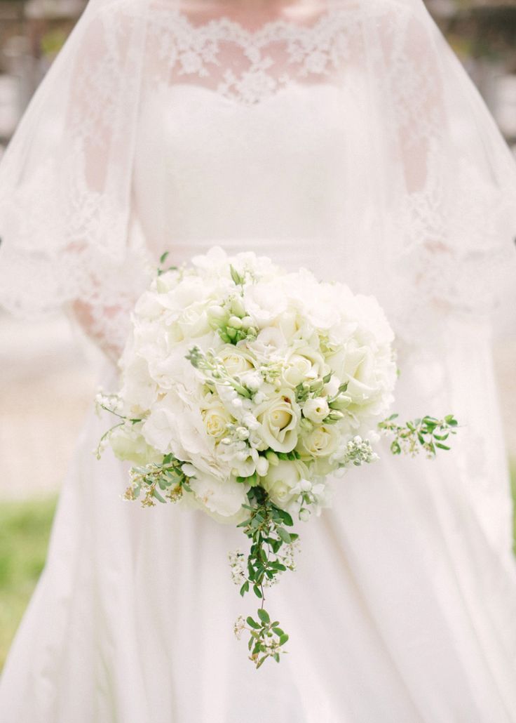 All White Bridal Bouquet - 20 Beautiful Bridal Bouquets for the 1950s Loving Bride
