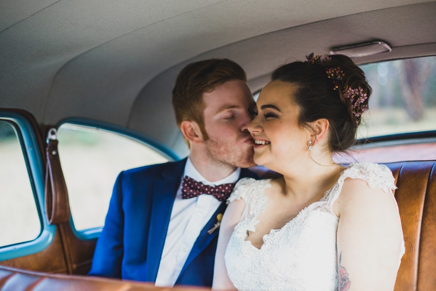 Bride & groom in the backseat