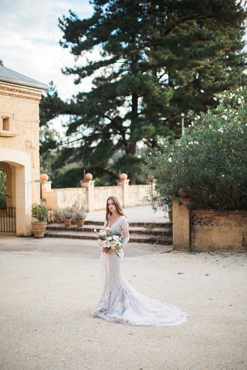 A stunning long sleeve fishtail wedding dress // Photography ~ White Images