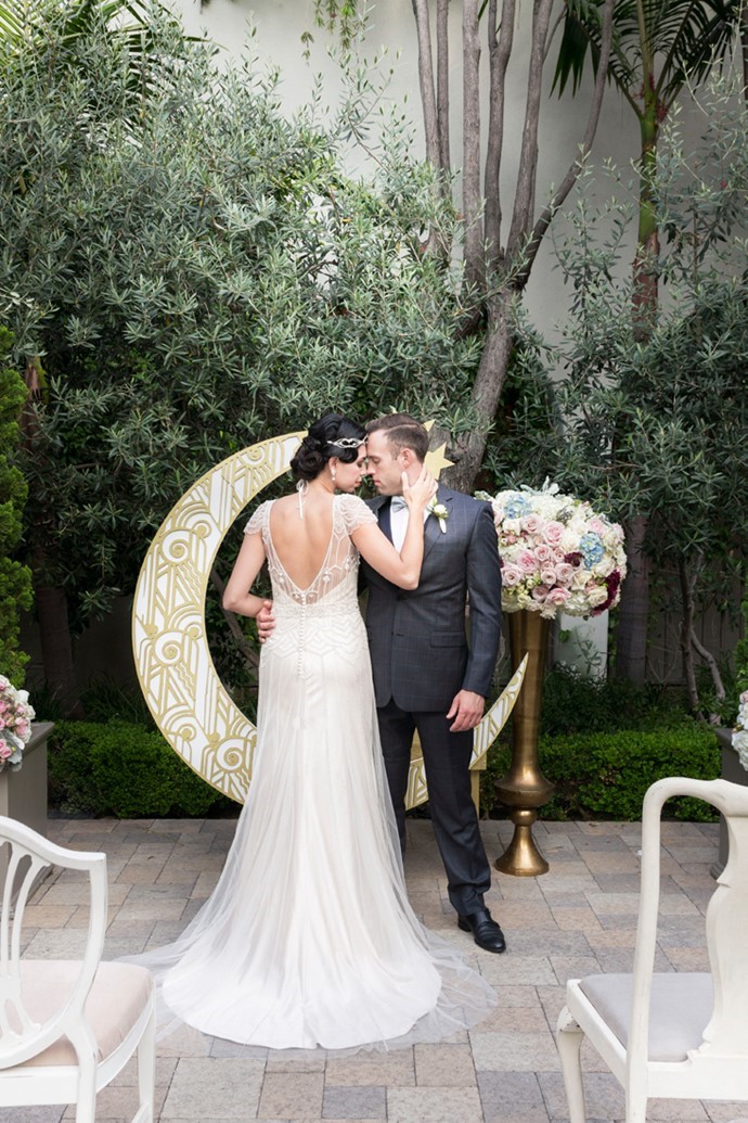 1920s Inspired Wedding Ceremony with a Paper Moon Backdrop