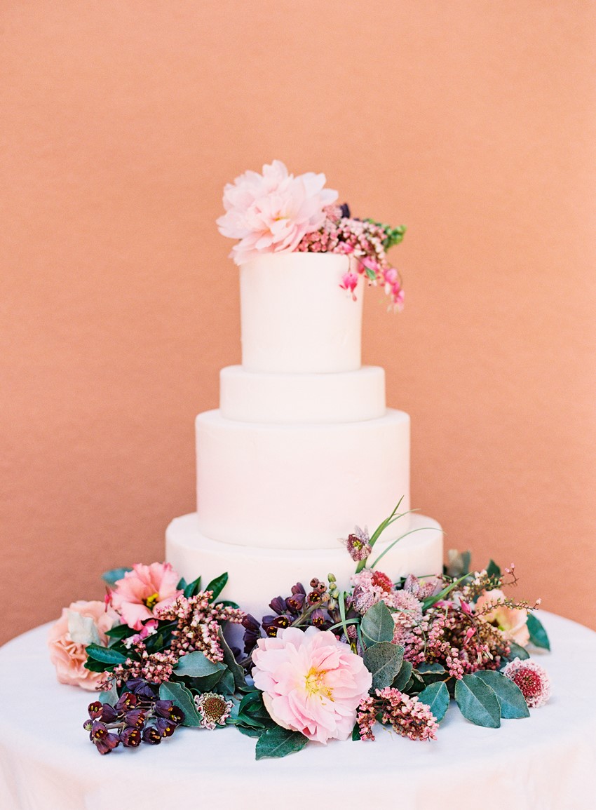 Flower Adorned Ivory Wedding Cake