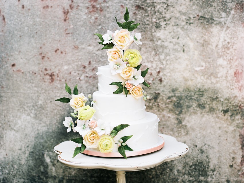 Peach & Yellow Flower Topped Wedding Cake