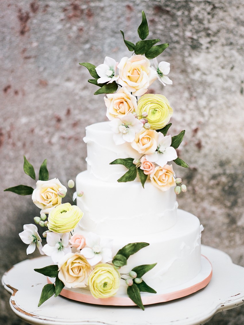 Peach & Yellow Flower Topped Wedding Cake