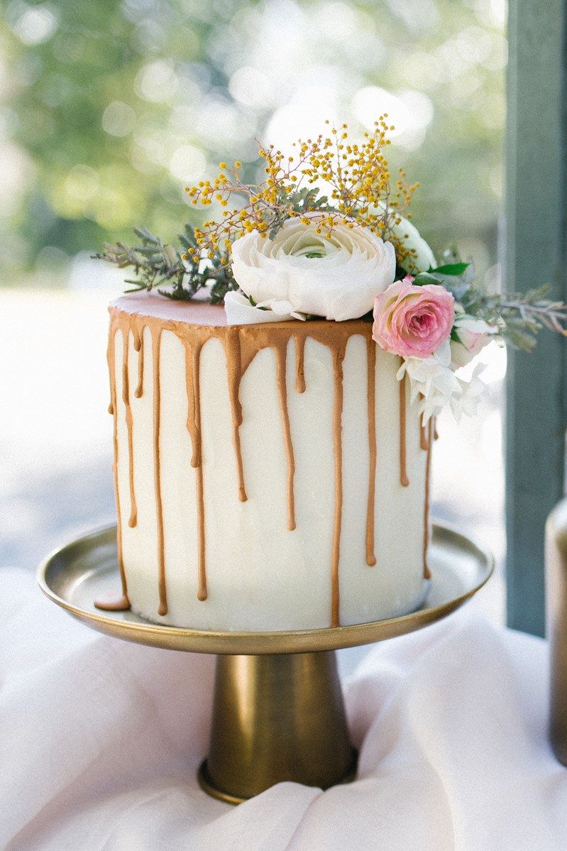 Romantic Flower Topped Drizzle Wedding cake