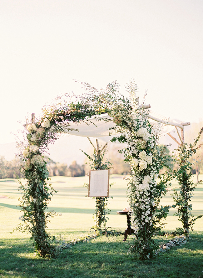 White Floral Wedding Aisle Arch