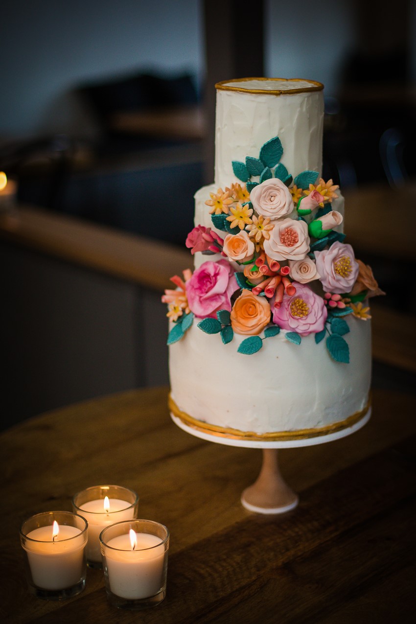 Flower Adorned Wedding Cake