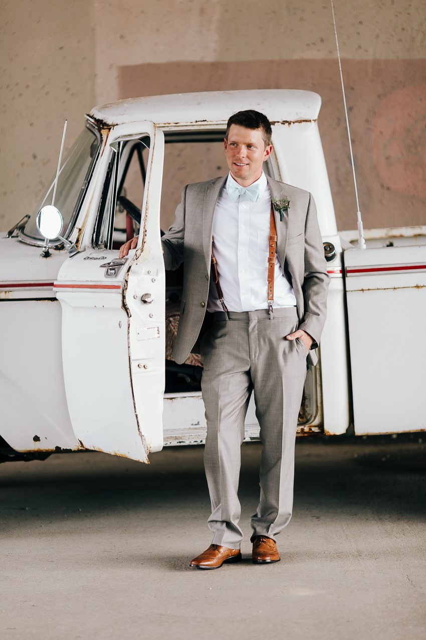 Vintage Inspired Groom with a Vintage Truck