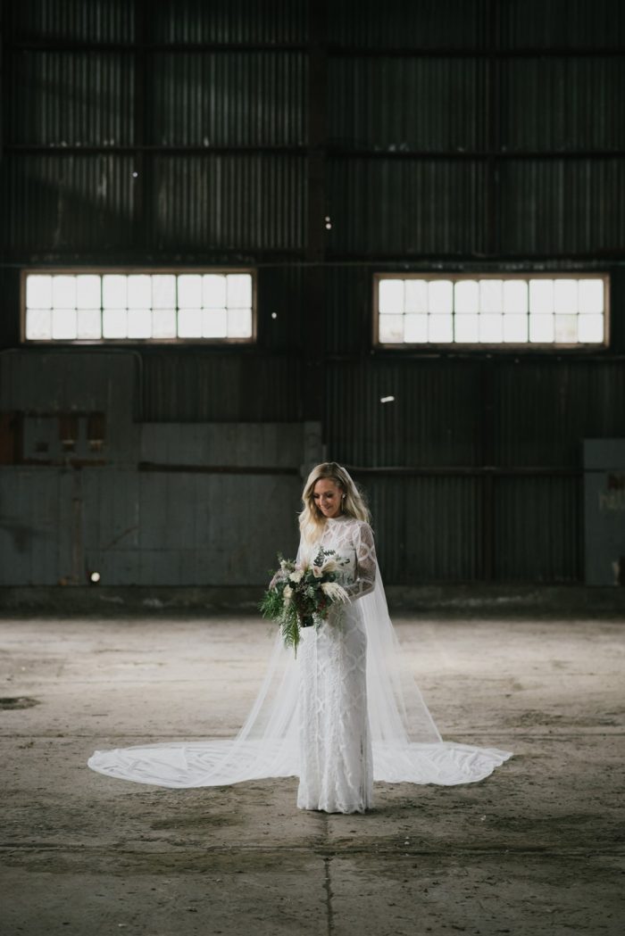 Bride in a long sleeve wedding dress