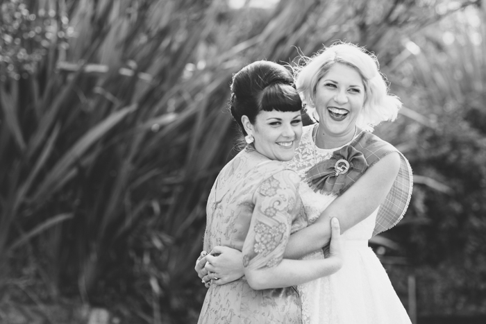 A Short Wedding Dress for a Fabulously Relaxed, 1950s Inspired Wedding from Emily Raftery Photography - Bride & Retro Bridesmaid