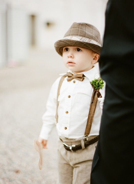 The Sweetest Vintage Ring Bearer wearing braces and a hat