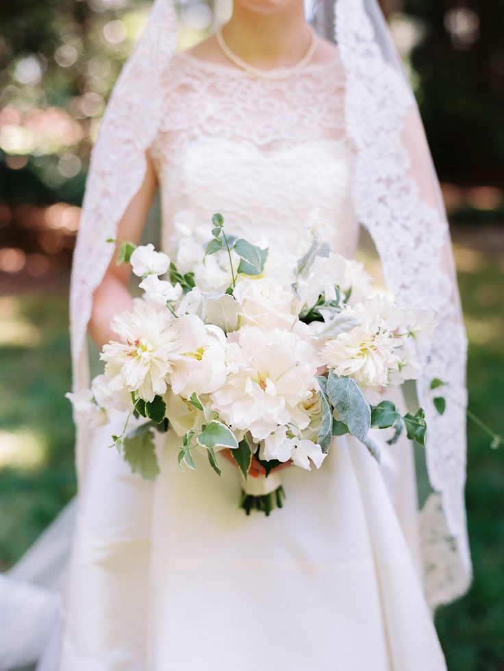 White Bridal Bouquet - 20 Beautiful Bridal Bouquets for the 1950s Loving Bride