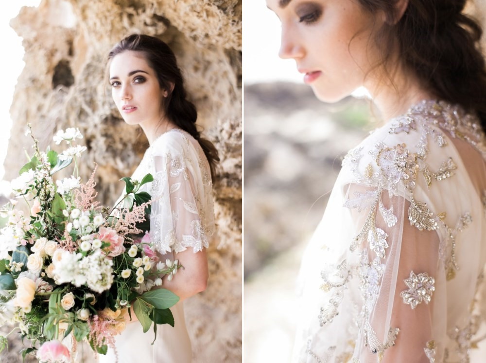 Elegant bride in a cape with an organic bouquet