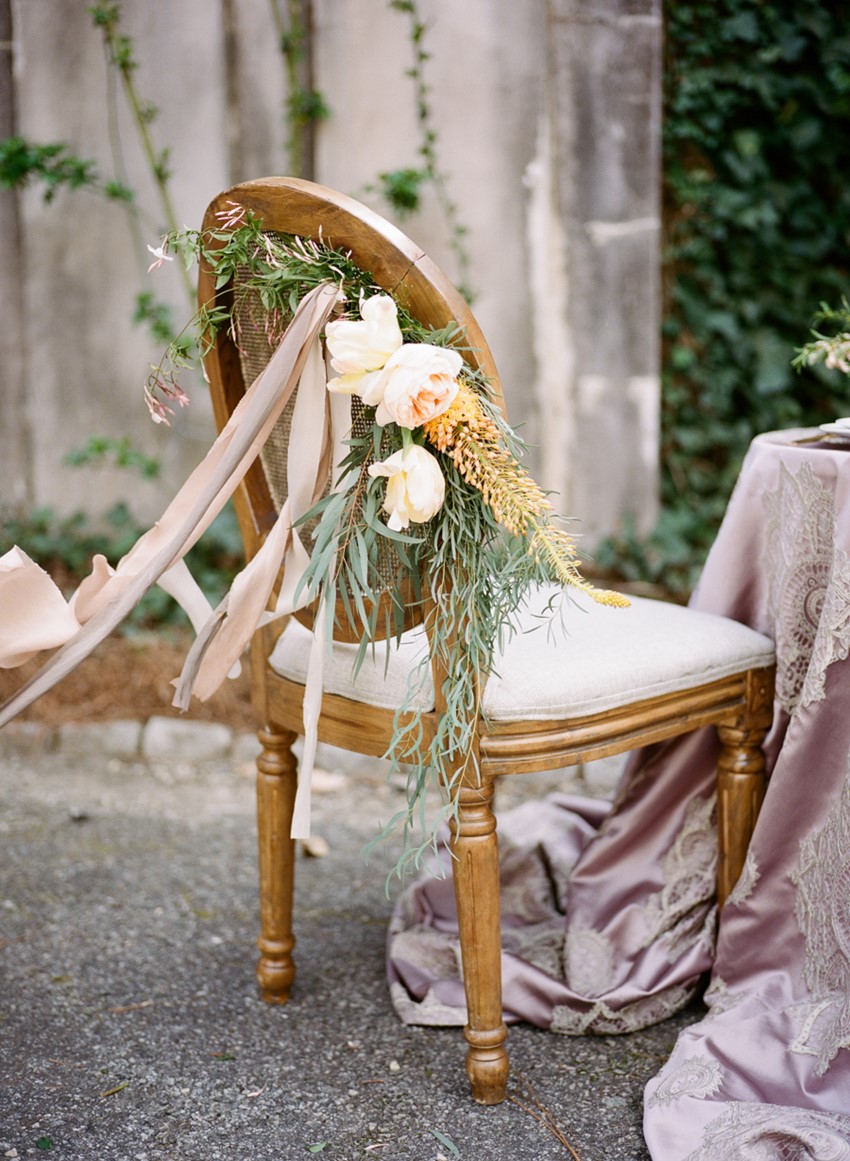 Floral Wedding Chair Decor Photography by Archetype Studios Inc