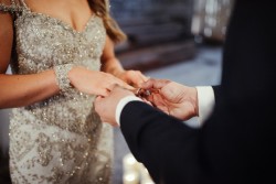 Exchanging rings // Photography by Brown Paper Parcel