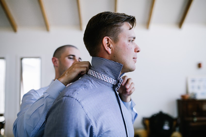Groom getting ready // Photography by Brown Paper Parcel