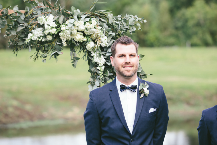 Groom in a Blue Suit & Bowtie // Photography - White Images