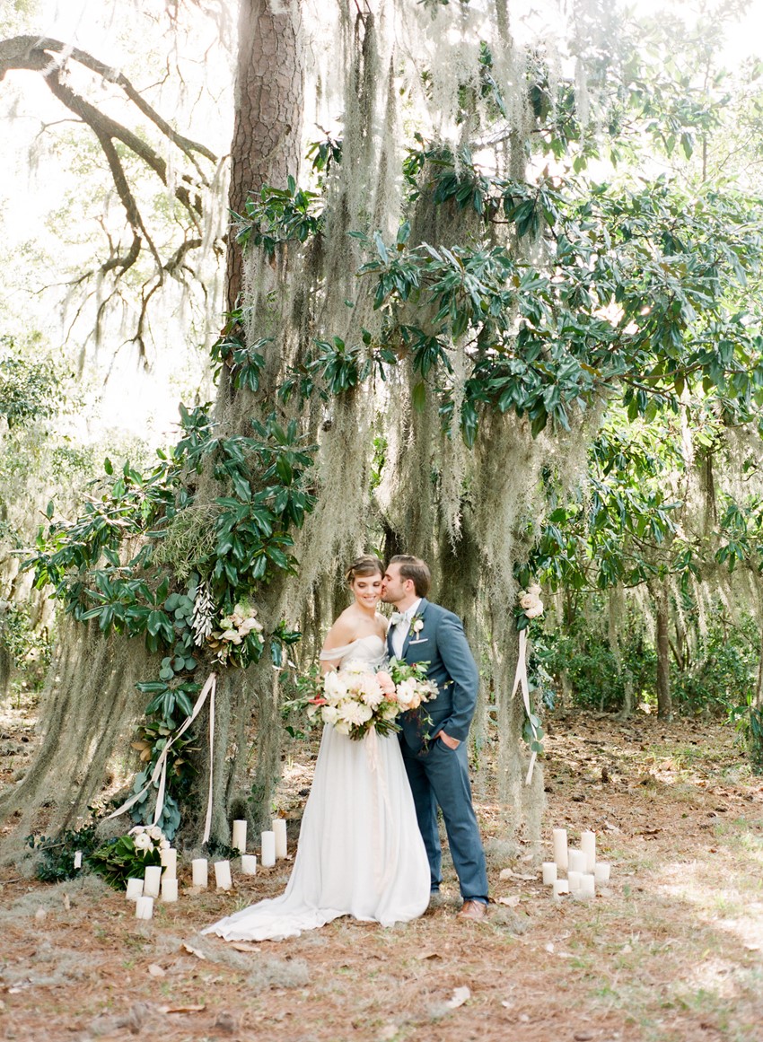 Magical Outdoor Wedding Ceremony Decor with Aisle Arch & Southern Moss // Photography ~ Eden Willow Photography