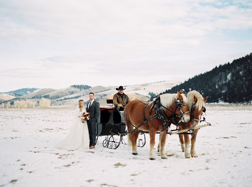 Horse drawn carriage for a romantic Snowy Winter wedding // Photography ~ Rebecca Hollis Photography