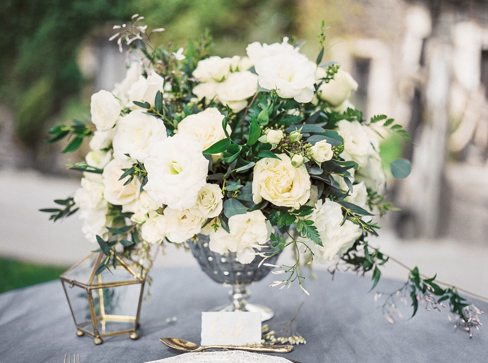 Old World Floral Wedding Centerpiece in a Silver Vase