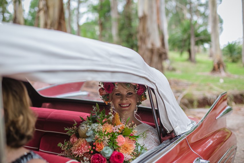 Bride Arriving in a Vintage Cadillac