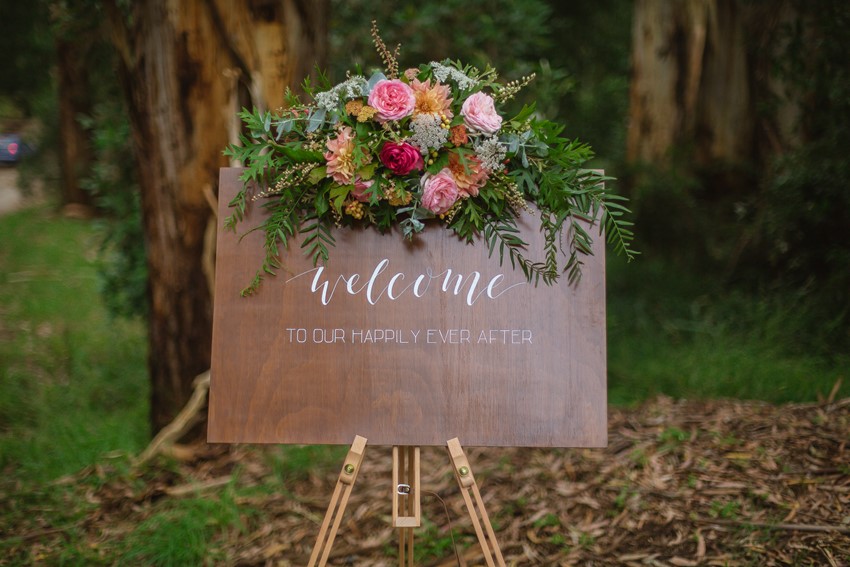 Flower Adorned Wedding Welcome Sign