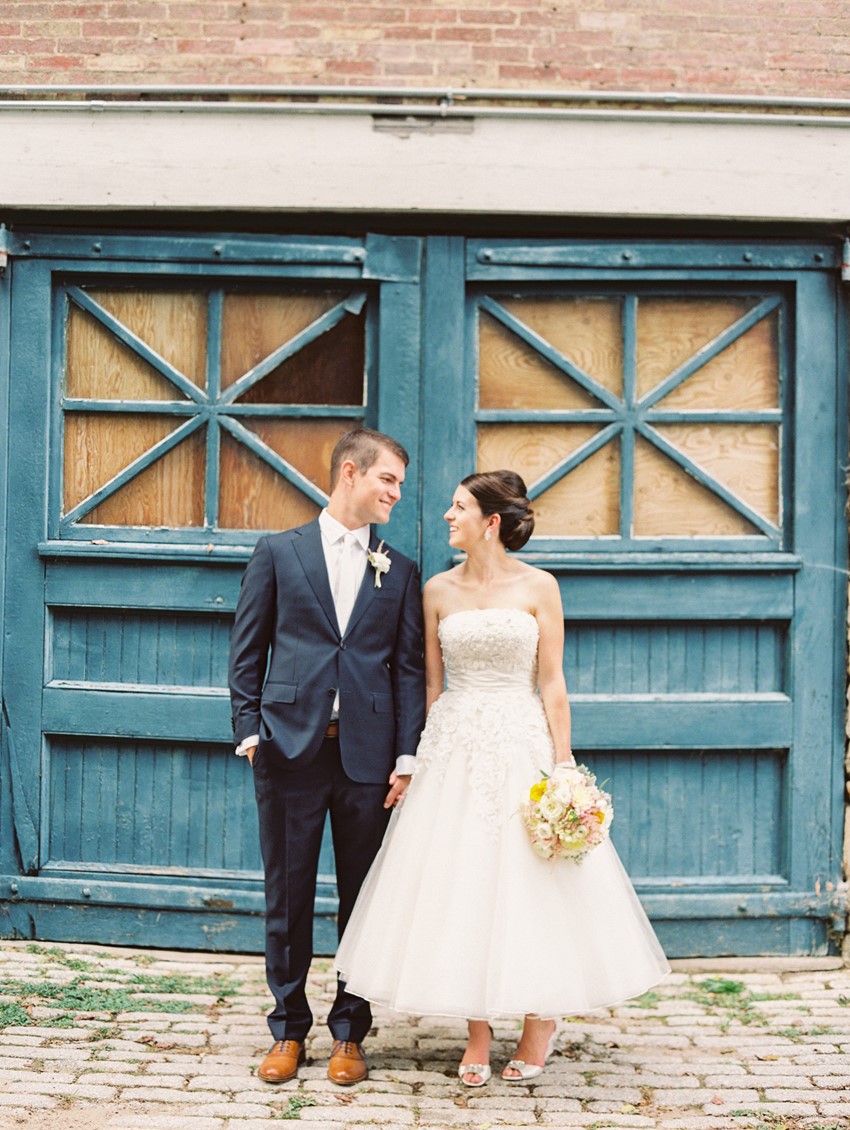 Groom & Bride in a Tea Length Wedding Dress