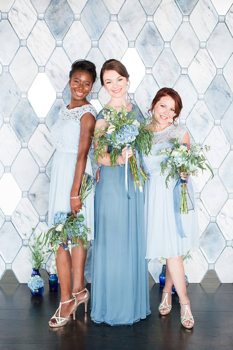 Bridesmaids in mismatched shades of blue