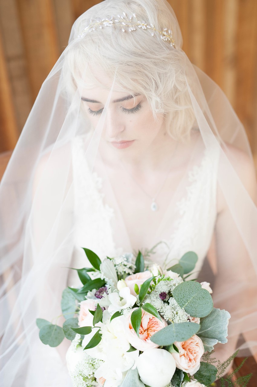 Bride in a Simple Tulle Veil
