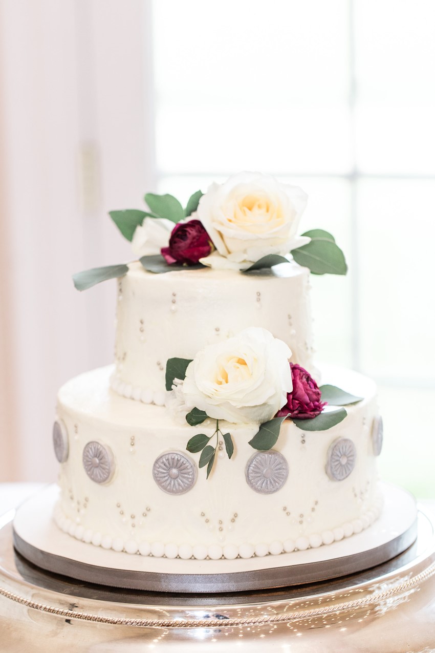 Red & White Floral Topped Wedding Cake